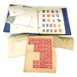 Philately. An album containing GB, Empire and commonwealth, and world stamps, together with envelope