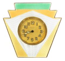 A Schild & Co Art Deco enamel travel clock, with a shaped three tier style, with green gold and silv
