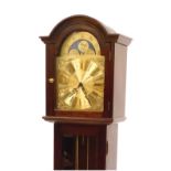 A 20thC mahogany case Grandmother clock, the brass break arch dial with chapter ring bearing Roman a