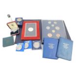 A group of collector's coins, comprising The Coins of Great Britain 1999 Coin Pack, Balliwick of Jer