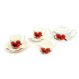 A Wedgwood Susie Cooper Designs Corn Poppy pattern part coffee service, comprising coffee pot, two c