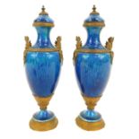 A pair of late 19thC blue glaze pottery vases, of baluster form, with classical brass mounts, 19.5cm