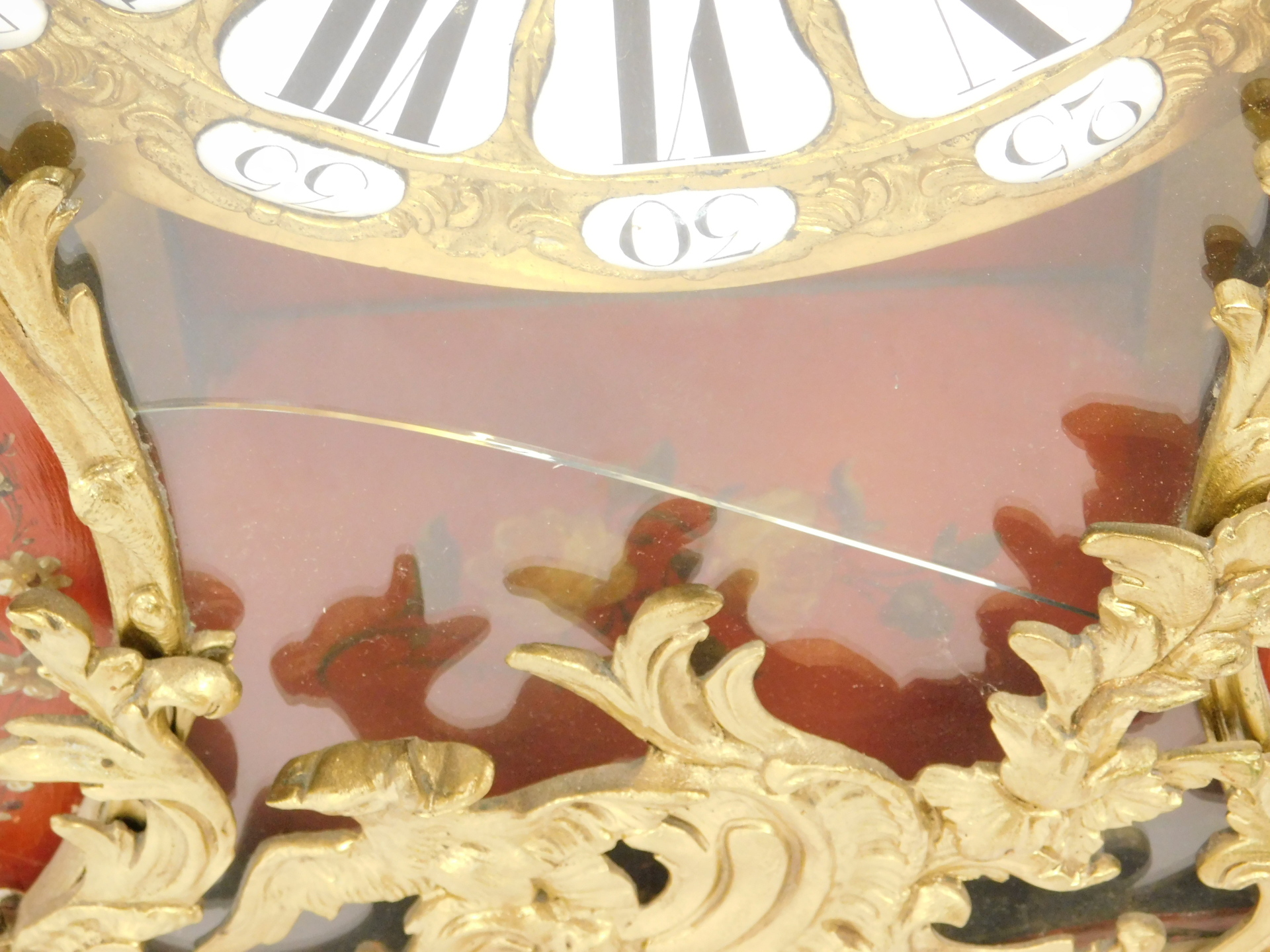 A French Louis XV style mantel clock, with hour glass shape, with gilt applied spandrels on a painte - Image 7 of 7