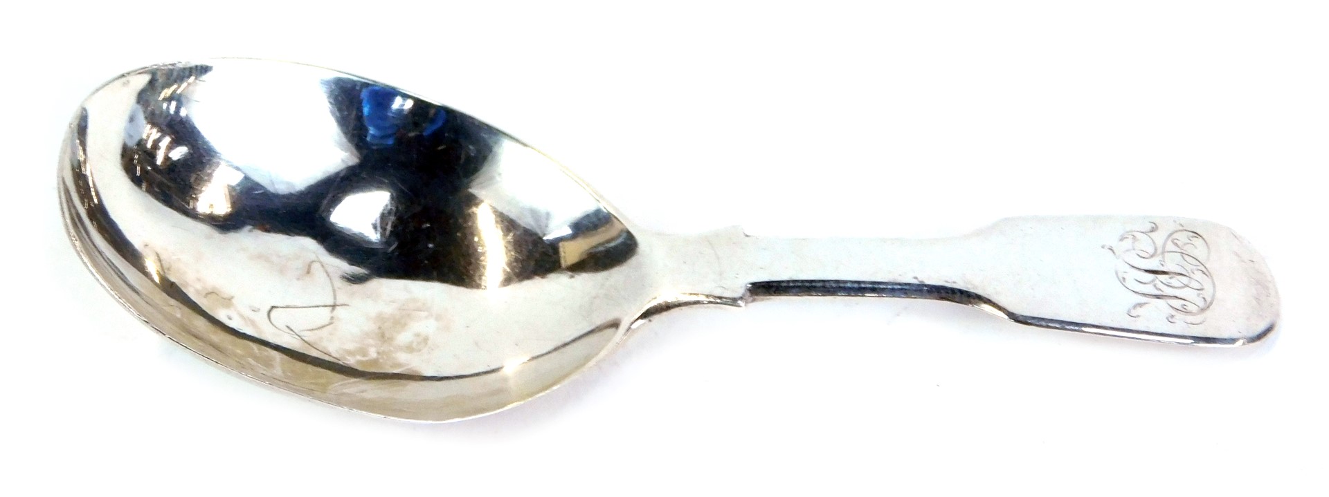 A George IV silver caddy spoon, with plain oval bowl and fiddle pattern handle, bearing a monogram,