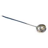 A George III silver toddy ladle, unmarked, with ogee bowl set coin centre and legend to the rim, wit