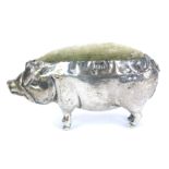 An Edwardian silver pig pin cushion, makers mark RP, Birmingham 1908, 1.22oz all in.