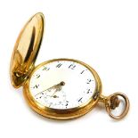 A Hunter pocket watch, yellow metal casing with white enamel numeric dial with seconds marker, stamp