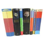 J K Rowling. Seven Harry Pottery Books, comprising Deathly Hallows, hardback with dustcover, first e