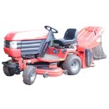 A Westwood T1600 ride on lawn mower, No 6K8E2 DOM 03/03/2010, in red, with powered rear grass collec