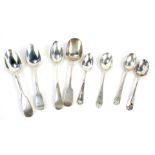 An assortment of various silver tea and coffee spoons, to include a golf trophy spoon, a fiddle patt