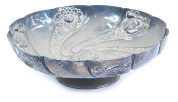 A Victorian silver circular bon bon dish, with spiral and repousse decoration of flower heads, and r