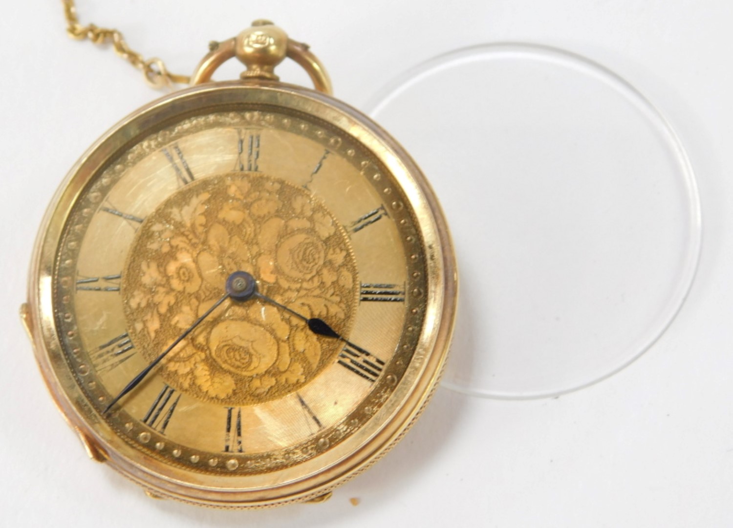 A lady's pocket watch, open faced, keyless wind, the floral design dial with blue enamel Roman numer - Image 2 of 3