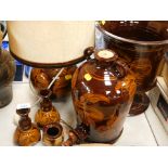 Various brown mottled wares, comprising table lamp, goblet, trinkets, etc. (a quantity)