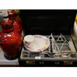 A Kuppels Bestecke cased canteen of cutlery, cup and saucer, and two table lamps.