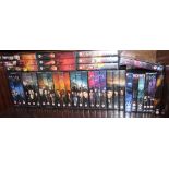 A group of Angel and Buffy VHS tapes. (1 shelf)