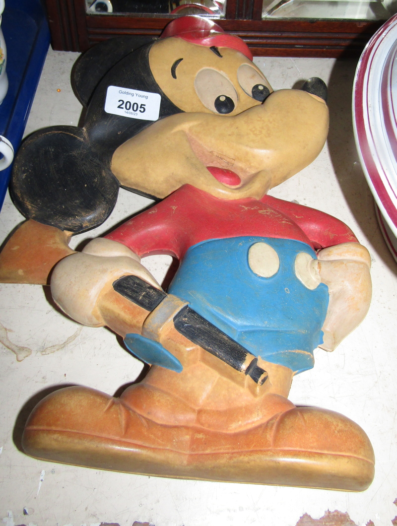 A 1965 Mickey Mouse hot water bottle, by Duarry of Spain, BS 1970, 5-80, 33cm high.