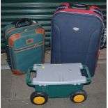 Two suitcases and a garden trolley. (3)