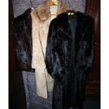 A faux fur coat and two fur coats. (3)