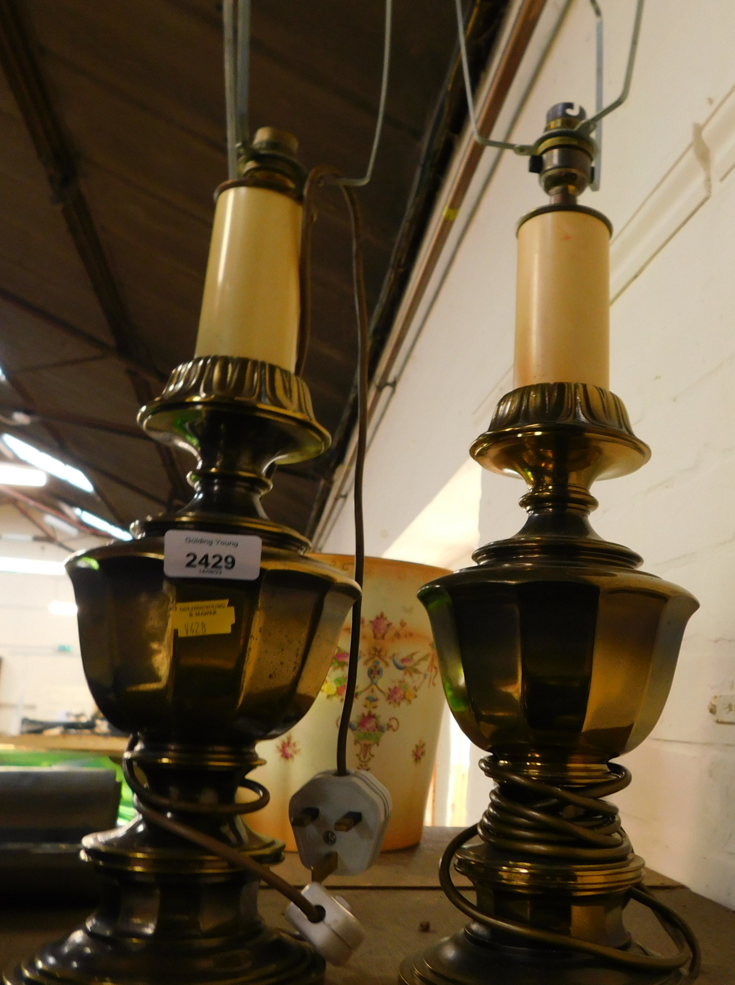 Two brass table lamps.