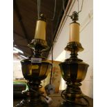 Two brass table lamps.