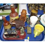 A brass mining ornament, two empty Bell's Scotch whiskey decanters, commemorative wares, etc. (1 tra