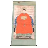 A Chinese ceremonial ancestor portrait scroll, in Ming style depicting an Empress in red robes, wate