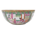 A 20thC Cantonese famille rose porcelain bowl, decorated with reserve panels of figures, birds and f