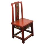 A 19thC Chinese red lacquer child's chair, with gilt decoration.