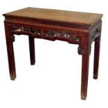 A Chinese elm top centre table, 84cm high, 102cm wide, 51cm deep.