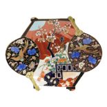 A Meiji period Japanese Koransha fan dish, incorporating two hand fan designs, with a central panel