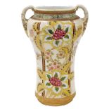 An early 20thC Imperial Nippon porcelain vase, of twin handled form, painted with flowers, 28cm high