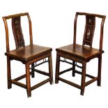 A pair of Chinese hardwood chairs, with bone inlaid splat backs.