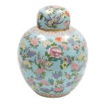 A 20thC Chinese famille rose porcelain ginger jar and cover, decorated with flowers in coloured enam