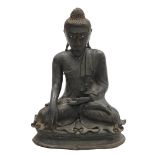 A 19thC Japanese patinated figure of Buddha, seated in bhumisparshamudra, 33cm high.