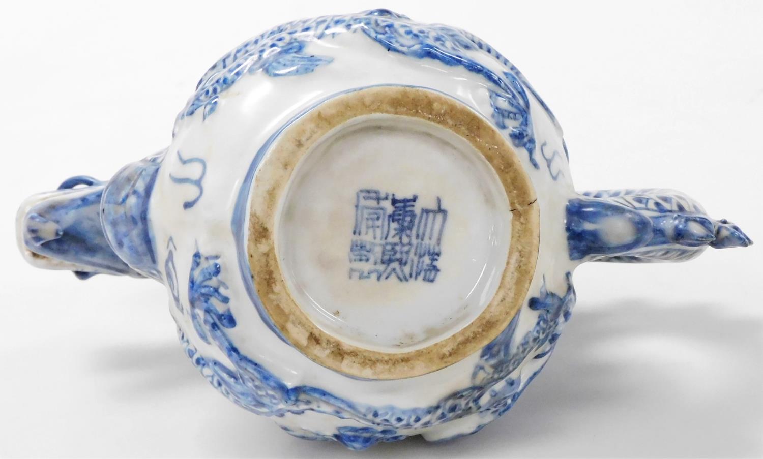 A 20thC Chinese blue and white bottle jug, with a dragon's head spout and tail handle, the bottle wi - Image 6 of 6