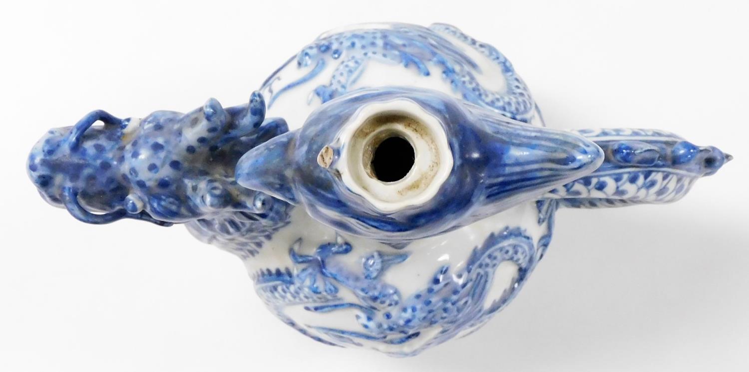 A 20thC Chinese blue and white bottle jug, with a dragon's head spout and tail handle, the bottle wi - Image 5 of 6