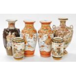 A group of early 20thC Japanese Kutani and Satsuma pottery, comprising a pair of Kutani vases, decor