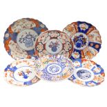 Six Meiji period Japanese Imari porcelain plates, each of scalloped form, variously decorated, some