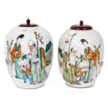 A pair of 20thC Chinese porcelain jars and covers, painted with Chinese deities including Shao Lao a