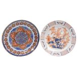 Two 20thC Japanese porcelain chargers, one decorated centrally with a flowering tree, the border wit