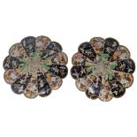 A pair of Meiji period Japanese cloisonne chargers, of petal form, each decorated centrally with a c