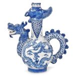 A 20thC Chinese blue and white bottle jug, with a dragon's head spout and tail handle, the bottle wi