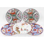 Five modern Chinese and Japanese porcelain plates, variously decorated, 26cm wide.