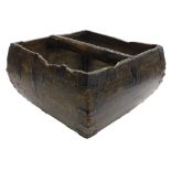 A Chinese wooden and metal mounted rice or grain bucket, of square tapering form with central handle