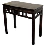 A Chinese altar table, with carved frieze, 82cm high, 87cm wide, 44cm deep.