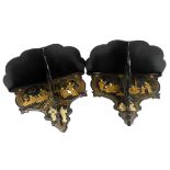 A pair of Victorian black lacquer papier mache wall brackets, in the Oriental style, decorated with