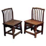 A pair of Chinese low chairs.