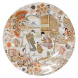 A Meiji period Japanese porcelain dish, decorated with figures, in an interior, Mount Fuji visible t