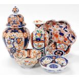 A group of Japanese Imari wares, comprising vase and cover, 32cm high, a vase of cylindrical taperin