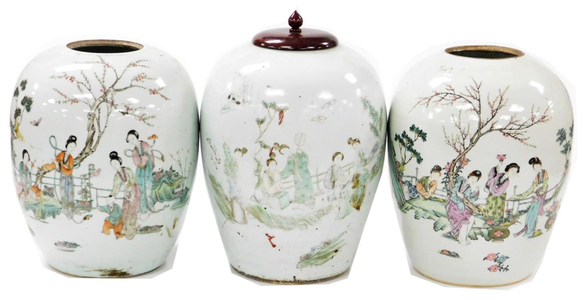 Three early 20thC Chinese jars, one with turned wood cover, decorated in famille rose palette with f